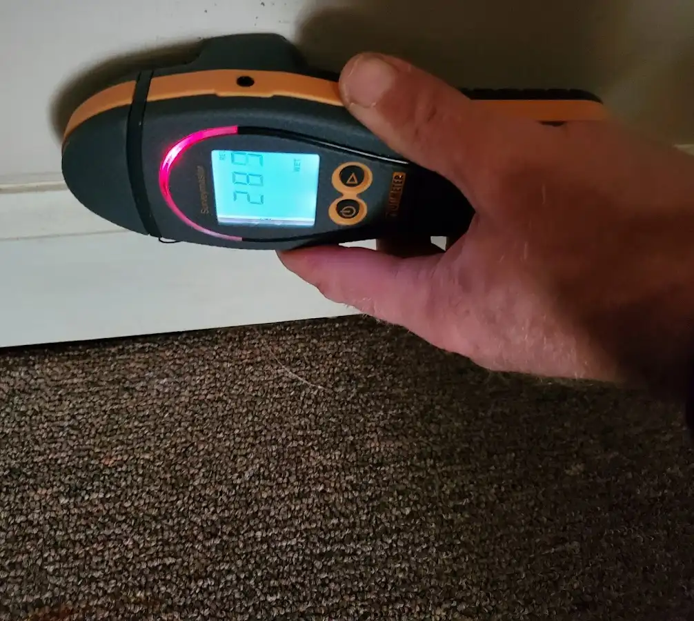 Moisture detection at baseboard during Storm Damage Restoration in Vacaville